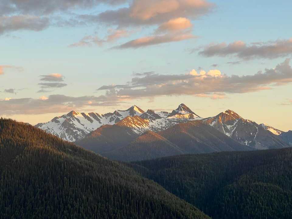 sunset snowcapped mountains