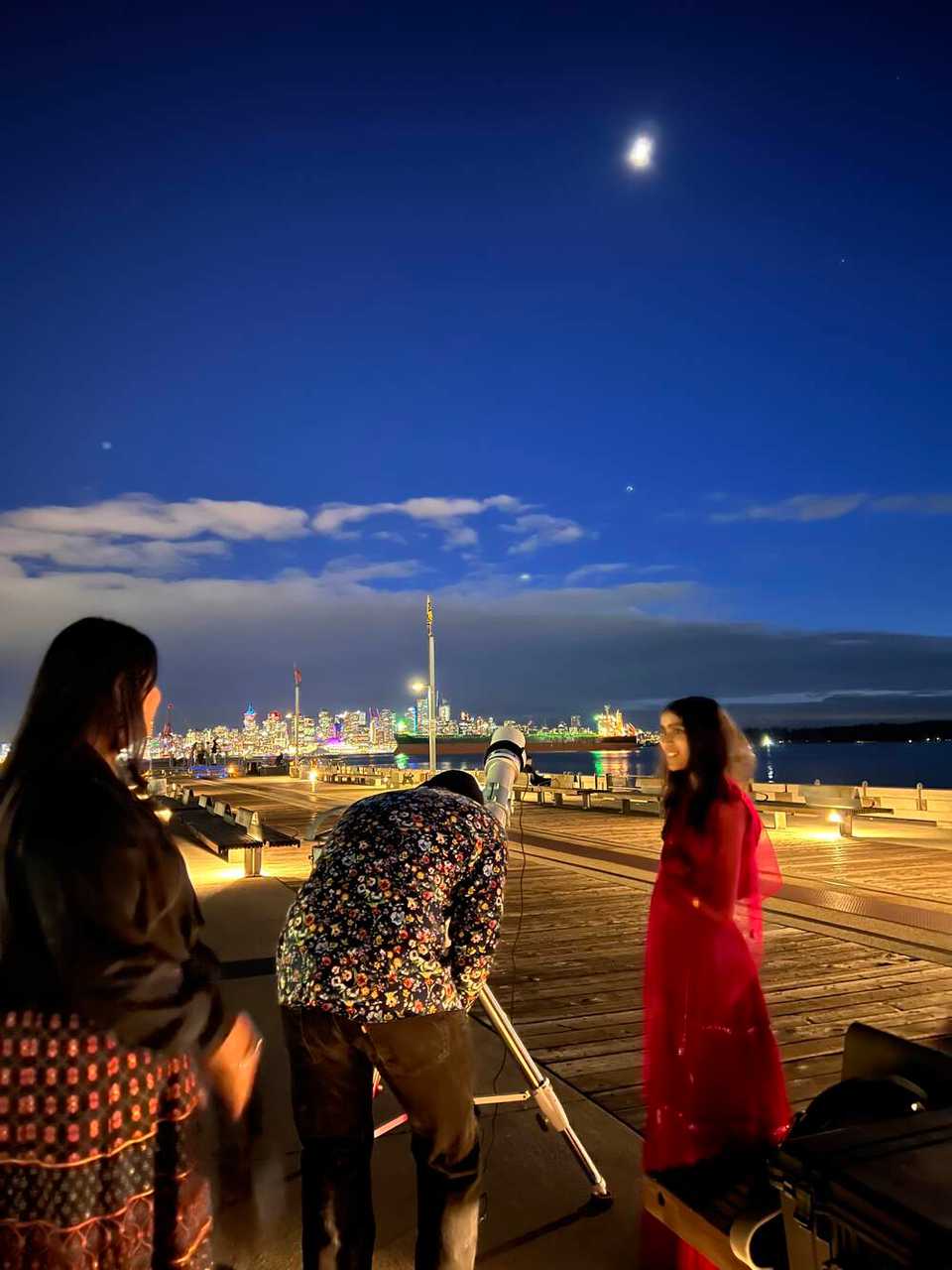 people viewing the moon