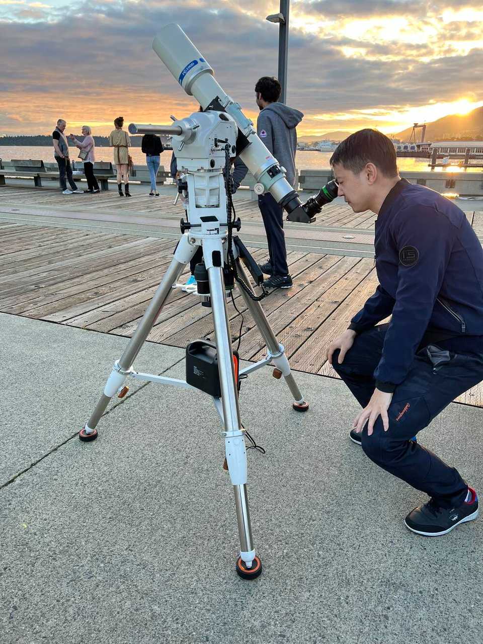 people viewing the moon